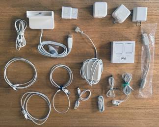 Apple products including chargers, iPod Shuffle, USB Super Drive, iPad Air