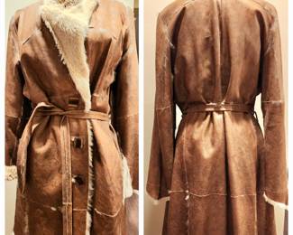 Asymmetrical shearling coat with matching belt.  Made in Italy.  Size M/L $350.00