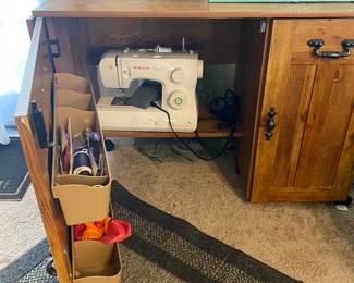 Second singer with sewing table