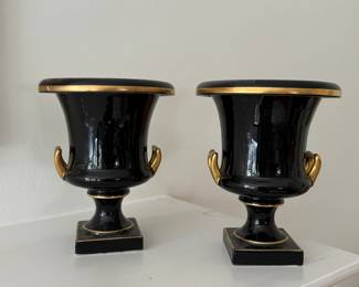 Pair of Ebony Urns with Gold Trim. 