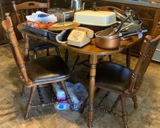 Kitchen ware and table with chairs