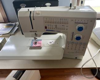 None much better than Bernina, with case and attachments…2 other sewing machines