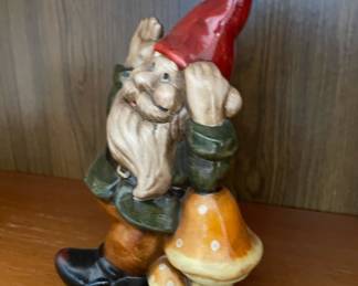 Ceramic Gnome Leaning on Mushroom Sculpture