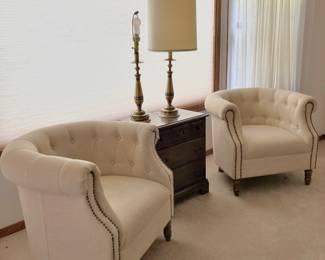 Pair of White Tufted Barrel Chairs with Studded Front