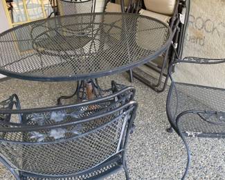 Black Wrought Iron Patio Table and Chairs with Vine Design