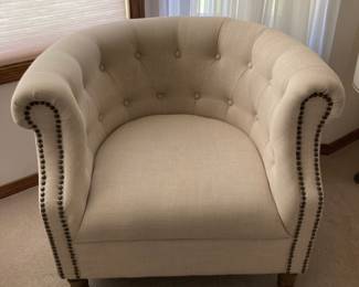 Pair of White Tufted Barrel Chairs with Studded Front