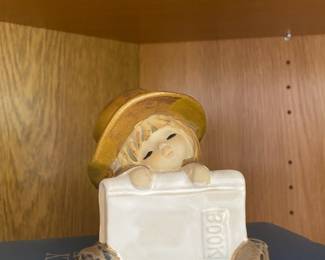Ceramic Figurine of Girl Holding Large Book
