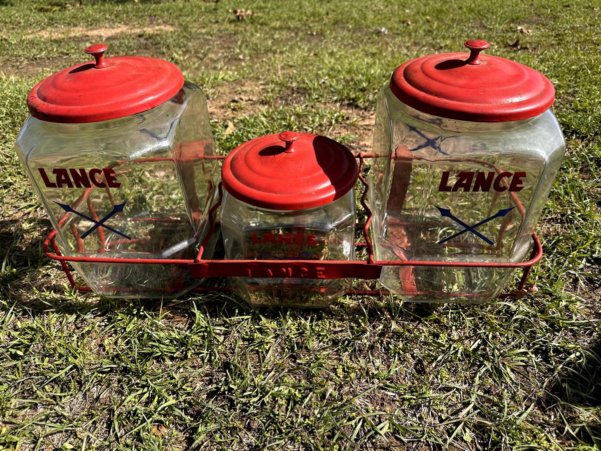 3 great Lance Jars and metal holder. Metal lids.. Great condition