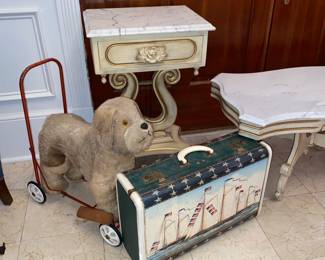 Vintage suitcase and riding dog..