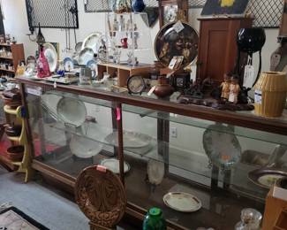 Large display cases and antique platters