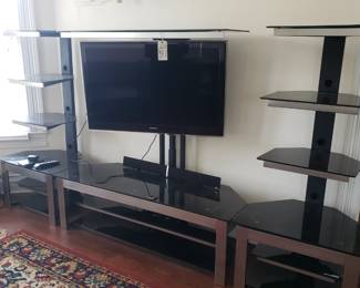 Very large black tempered glass entertainment center $300