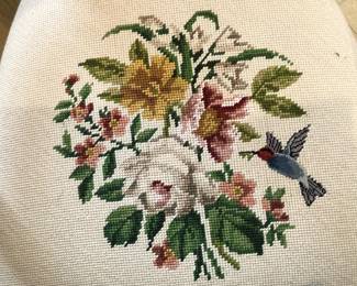One of the needlework chairs