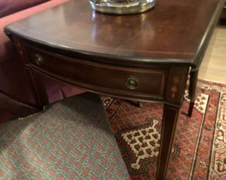 The table has a drawer.