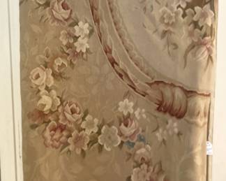 Large Aubusson rug (draped over a door)