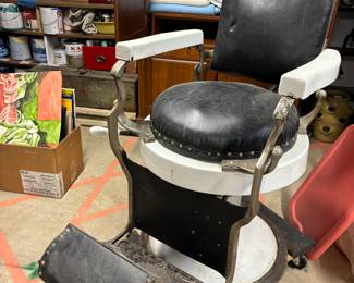 homeowner purchased this antique barber chair approximately 40 years ago from a local antique store and had seat recovered