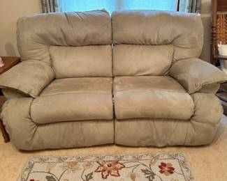 Nice Beige Rocking/ Reclining Love Seat from Rothman Furniture
