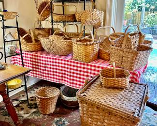 a large collection of split white oak baskets, all hand woven