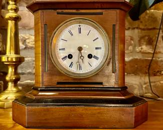 beautiful small mantle clock, very French in comparing styles. Also running!
