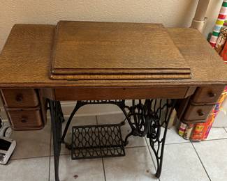 this Singer sewing machine cabinet is in extraordinary condition. However, the machine is not inside of it. If you’ve been looking for one of these to use as a table or nightstand here it is come and get it.