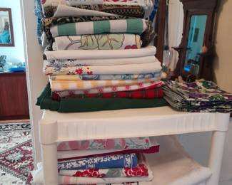 Tons of vintage table cloths and linens