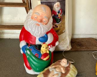 Kneeling Santa and baby Jesus blow mold