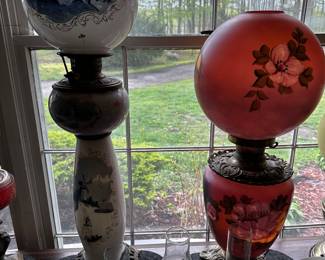 The large blue banquet hurricane lamp has NOT been electrified! Still ready for oil! 