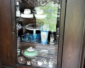 A beautiful 1930's Mahogany? China Cabinet! It also has a companion Side Board and Table! This piece is stuffed chuck full of MORE great treasures! 