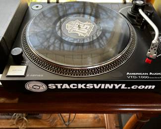 A nice DJ set up! Two turntables, two speakers and a receiver. ALL five pieces sold as a set for one price! Table is INCLUDED! All work! 