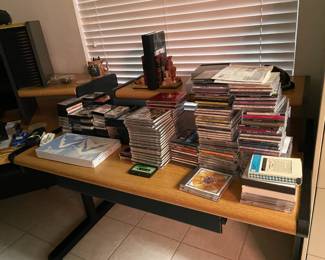 We have quite the office 6 pc desk ,tables etc. CD's DVDs VHS * track ( Great office)