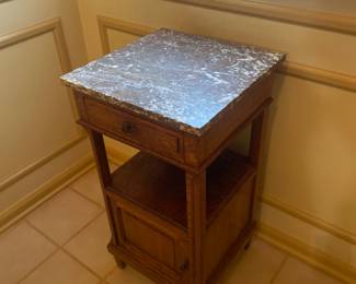 WE HAVE A PAIR OF THESE SOLID OAK MARBLE TOP STANDS (LARGER MATCHING PIECE IN THE BASEMENT)