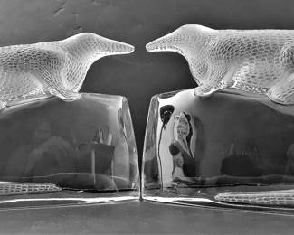 RARE Lalique Sobek (Egyptian Crocodile) Bookends in PRISTINE condition.  One of them has the original sticker, and each piece has four protective felt pads.  (Each measures 8.2” in length, 7.7” in height and 3.2” in depth). They are heavy and each bookend weighs 12 lbs.  Total weight 24 lbs. - $1,900.00