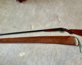 Long John 12 gauge shotgun