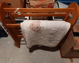 Quilt rack and vintage quilt