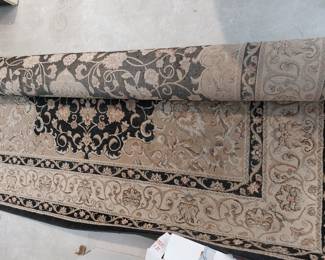 large area rug black and tan