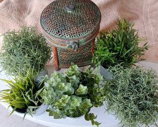5 greenery decorations and a weave container