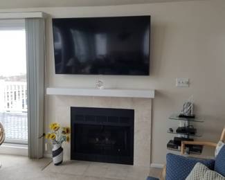 Large flat Samsung screen TV with wall mount