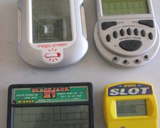 Assortment of Vintage Hand-Held Gaming Devices