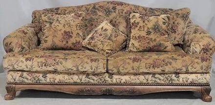 8114 - Ashley upholstered sofa, carved base as is, discoloration on upholstery 39 x 85 x 39
