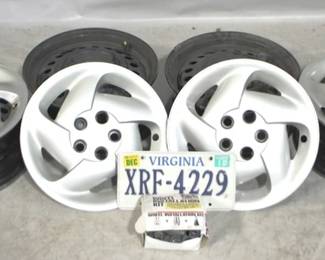 7719 - 4 - 14" Steel Rims/Wheels w/ plastic hubcaps
