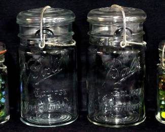 4062 - 4 Vintage jars, 2 with marbles
