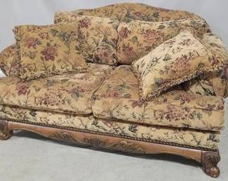 8113 - Ashley upholstered loveseat, carved base as is, discoloration on upholstery 37 x 66 x 40
