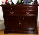 Beautiful Bassett Furniture sideboard that expands for serving