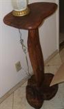 Carved wood entry stand.