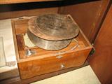 antique music box with metal disks
