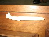 Ivory or bone figural letter opener
