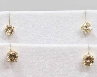 #712 • (2) 14K Diamond Stud Earrings, 1.99g
