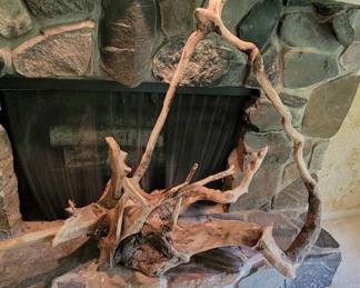 NATURAL DRIFTWOOD WITH ENTWINED STONE AT BASE