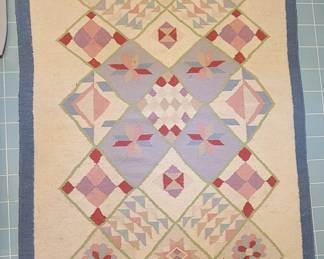 HAND WOVEN RUG