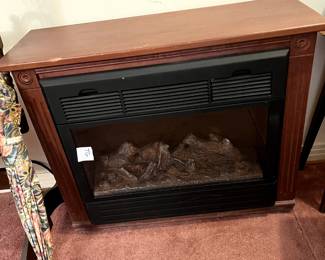 #67 Electric Fireplace/Heater 31x11x25 $75.00