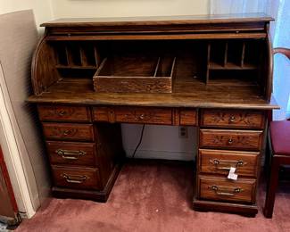 #2	Roll top desk with 7 drawers and cubbies 54x24x46 as is finish	 $100.00 			
